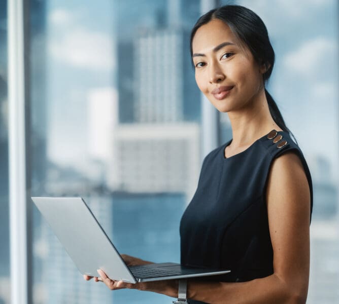 Beautiful Portrait of an Asian Businesswoman in Stylish Black Dr