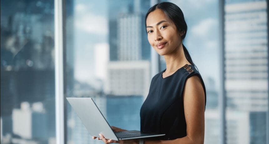 Beautiful Portrait of an Asian Businesswoman in Stylish Black Dr