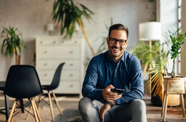 Portrait of a smiling businessman, looking at the camera